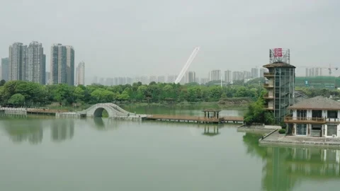 Arch Bridge On Moon Lake Stock Footage 167927751