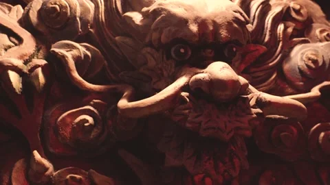 A arch camera take of golden dragon carving on a red wall. Stock Footage 140238487
