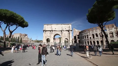 Arch of Constantine and Colosseum in Rome, Italy Stock Footage 82055628