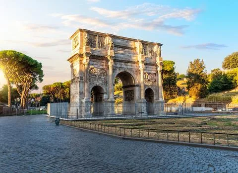 The Arch of Constantine at sunset, famous ancient triumphal arch of Rome, Italy Stock Photos