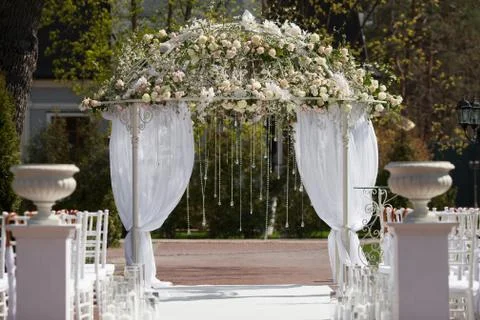 Arch  in the garden for wedding ceremony Stock Photos
