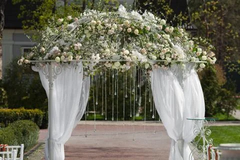 Arch  in the garden for wedding ceremony Stock Photos
