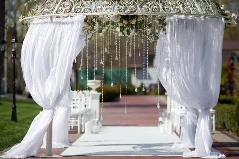 Arch  in the garden for wedding ceremony Stock Photos