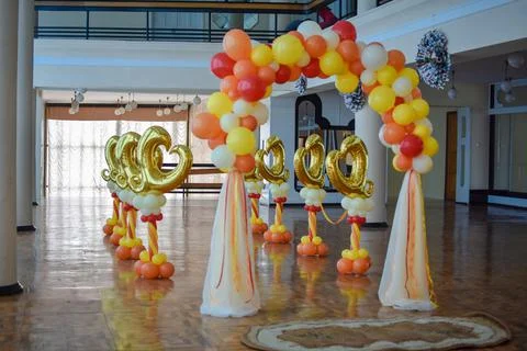 An arch of multi-colored balloons. decor of balloons. place of the wedding Stock Photos