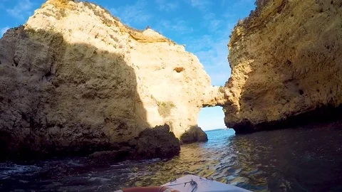 Arch in  sandy cliff on sea 스톡 동영상 83504255