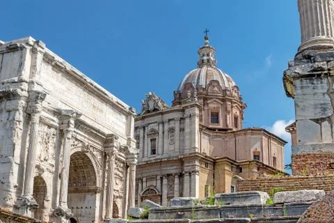 Arch of Septimius Severus , Column of Phocas and Church of Santi Luca e Marti Stock Photos