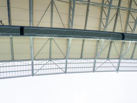 Arch of the stadium. Engineering design. Part of the roof of the stadium. Stock Photos