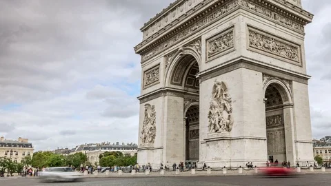 The Arch of Triumph (Arc de Triomphe) in Paris. Cloudy, dramatic sky. Stock Footage 87537270