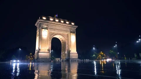 The Arch of Triumph in Bucharest during a thunderstorm Stockbeeldmateriaal 80332410