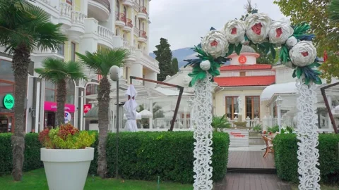 Arch of white flowers background building Stock Footage 143806579