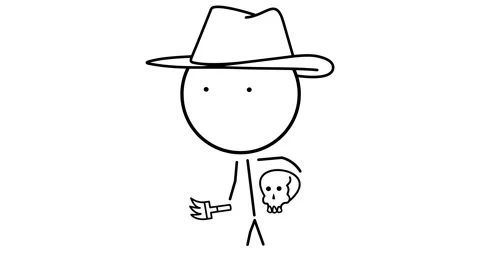 Archaeologist with a brush and a skull Stock Footage 294425517