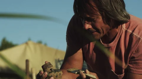 Archaeologist Discovers an Ancient Pot Stock Footage 62862417