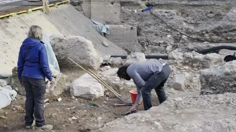 Archaeologist people digging artifacts a... | Stock Video | Pond5