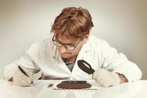 Archaeologist researcher taking samples of cuneiform material Stock Photos