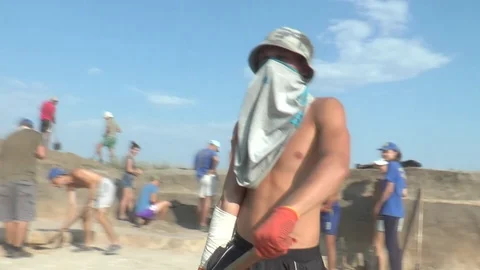  Archaeologists excavate ancient settlement Stock Footage 104956201