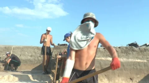 Archaeologists excavate ancient settlement Stock Footage 104956203
