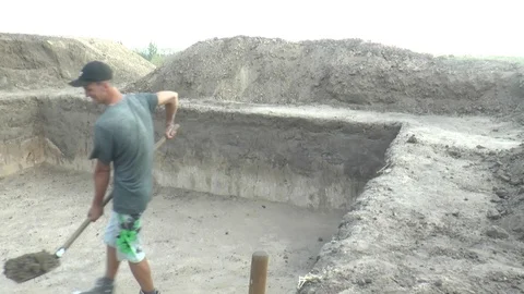  Archaeologists excavate ancient settlement Stock Footage 104959383
