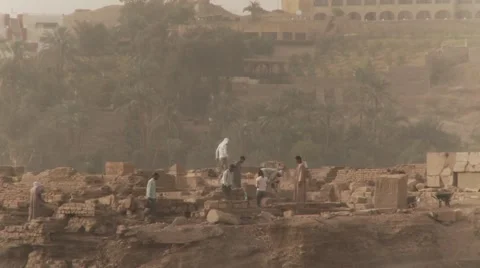 Archaeology workers excavate archeological dig at Aswan Egypt Stock Footage
