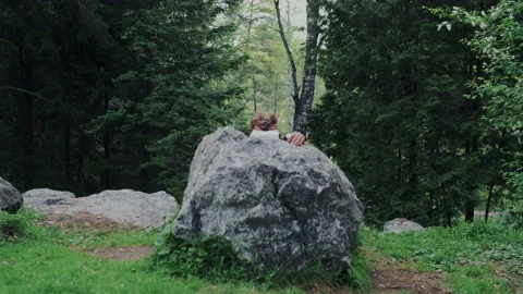 Archaic Hunter, Leader of Tribe Using VR Glasses with Futuristic Augmented Stock Footage 130907591