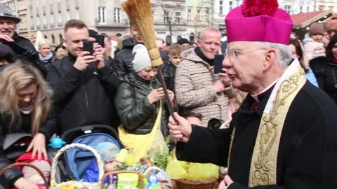 Archbishop Marek Jedraszewski blessing   Easter food baskets Stock Footage 237812639