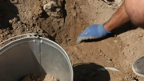 An archeaologist works with soil 8 Stock Footage 323791478