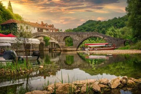 Arched bridge at sunset Stock Photos