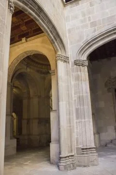 Arched columns in the middle of an ancient building Stock Photos