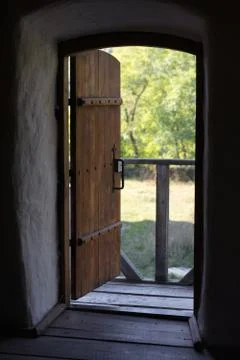 Arched door in an old building Stock Photos