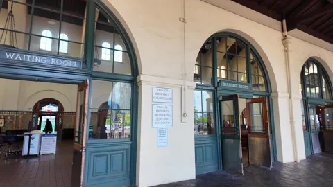 Arched doors and windows of the waiting room at the historic Santa Fe Depot in Vídeos de archivo 339973964