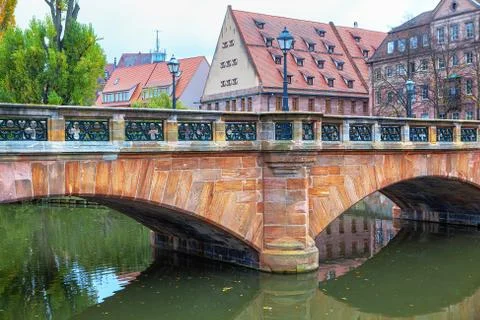 Arched medieval bridge Stock Photos