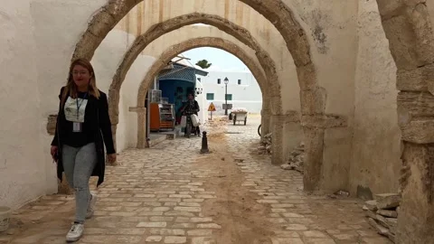 Arched passage of houmt souk bazaar on djerba island in tunisia Stock Footage 280691990