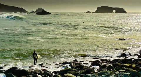 Arched rock beach Stock Photos