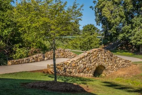 Arched stone bridge Stock Photos