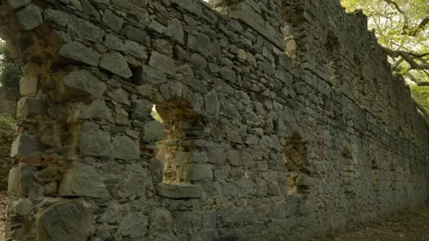 Arched stone wall at Kirazli Monastery ruins Stock Footage 336467009