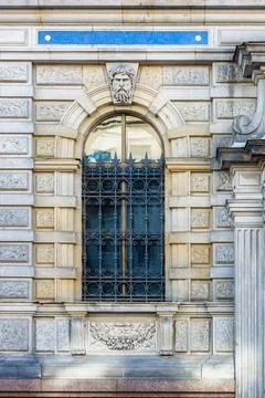 Arched window with a lattice. Stock Photos