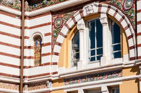Arched window with ornaments Stock Photos