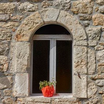  arched window on stone wall, Hydra island, Greece Stock Photos