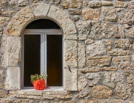  arched window on stone wall, Hydra island, Greece. Space for typing Stock Photos