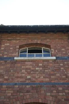 Arched Window On Traditional Red Brick Wall, Bulcote, Nottinghamshire, England Stock Photos