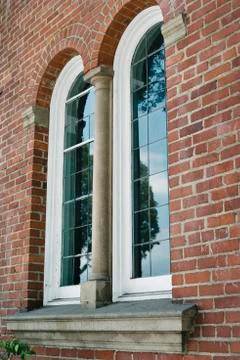 Arched Windows on Old Brick Building Stock Photos