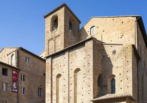 Arched windows under a clear blue sky in Urbino, Italy Stock Photos