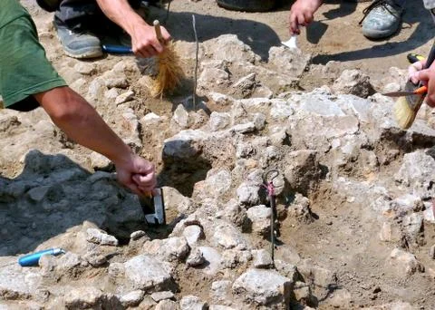 Archeologists at work on site Stock Photos