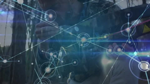 Archer aiming compound bow in forest, with glowing technology network nodes Stock Footage 328007323