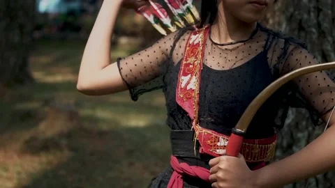 Archer Pulling Arrow from Quiver, Close-Up Stock Footage 211911218