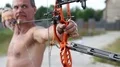Archer shooting a bow at a target HD Footage