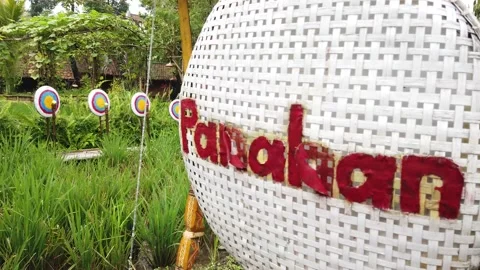 Archery Area in the Rice Field, Established Shot of Floating Market Lembang Stock Footage 130287256