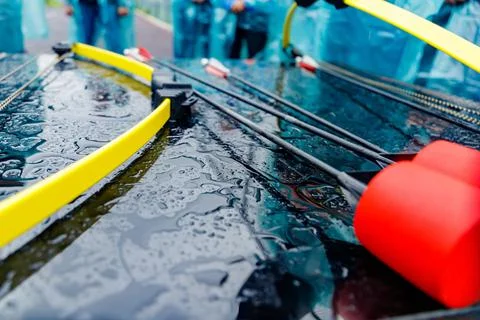 Archery with soft-tipped arrows lying on a table in the rain Stock Photos