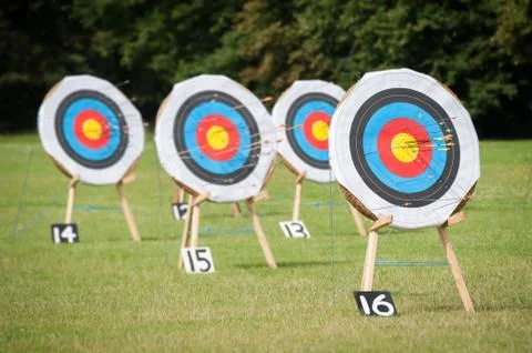 Archery targets at various distances on a range Stock Photos
