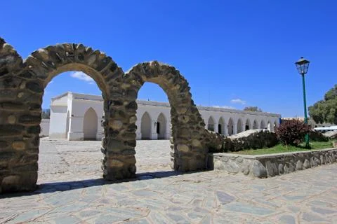Arches behind main square, mountain village Cachi, Argentina Stock Photos