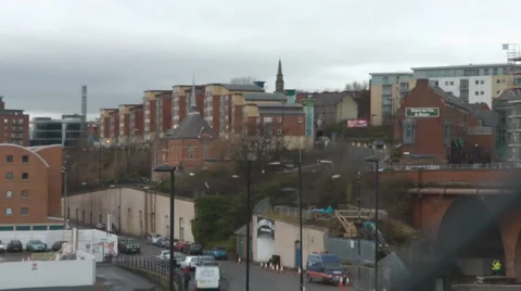 Arches of red brick bridge, mill chimney under renovation, police car passing Stock Footage 1104203